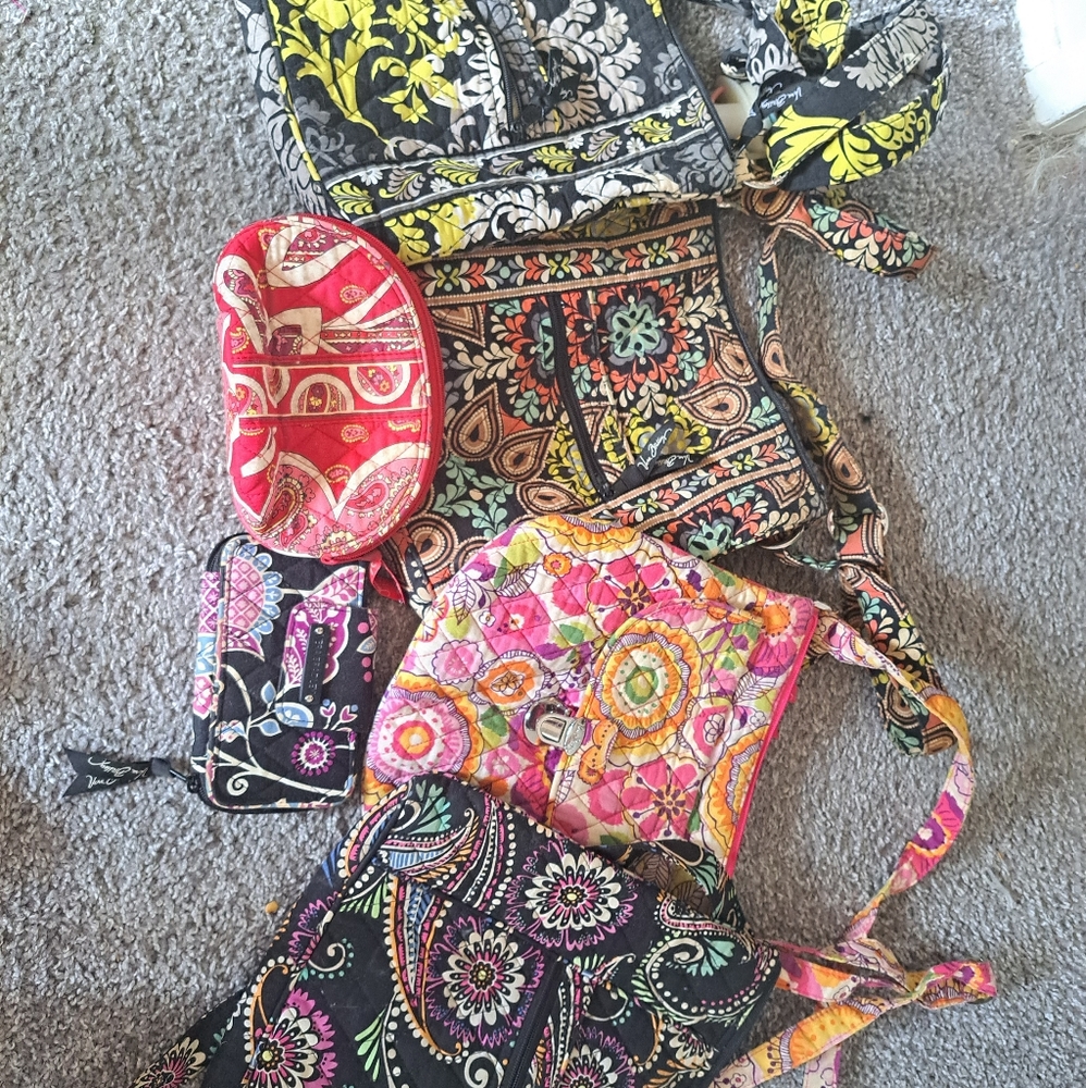 Vera Bradley bundle 4 purses, 1 cosmetic bag and 1 wallet.